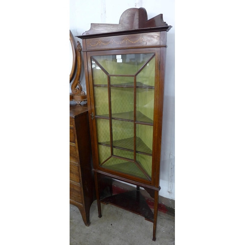 131 - An Edward VII inlaid mahogany corner cabinet