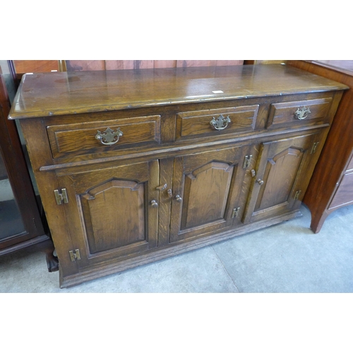 160 - A George III style Ipswich oak dresser