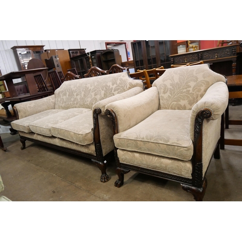 209 - An Edward VII carved mahogany and fabric upholstered settee and armchair