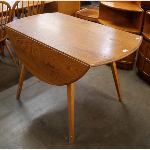 21 - An Ercol Blonde elm and beech Windsor drop-leaf table