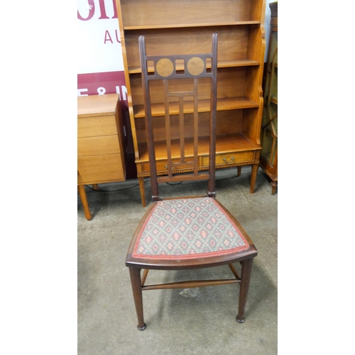 213 - An Arts and Crafts inlaid mahogany side chair