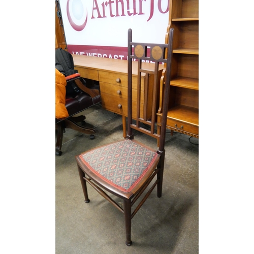 213 - An Arts and Crafts inlaid mahogany side chair