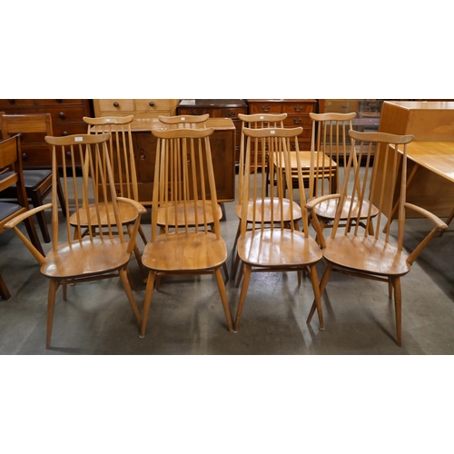 25 - A set of eight Ercol Blonde elm and beech Goldsmith chairs