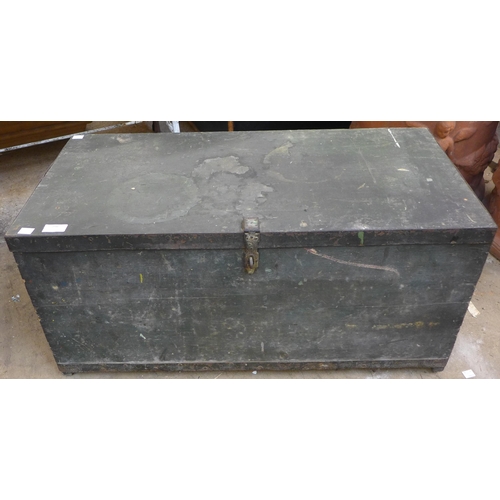 296 - An early 20th Century wooden tool chest with tools