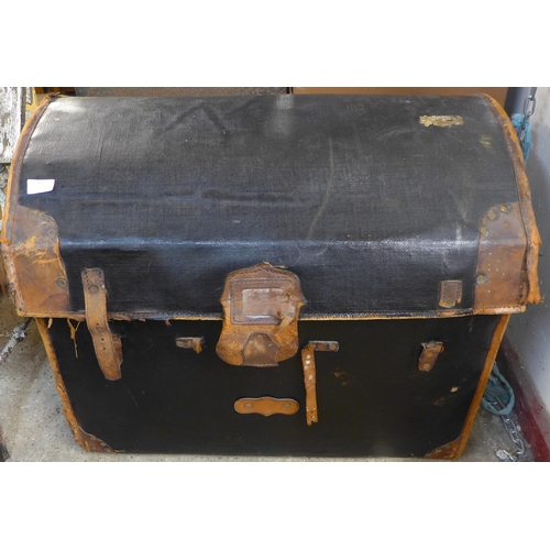 297 - A Victorian black leather steamer trunk