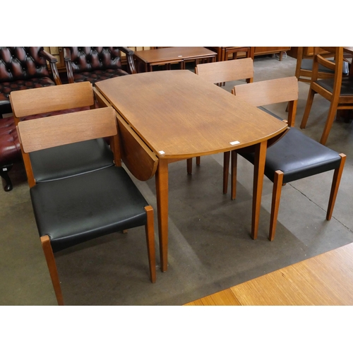 3 - A teak drop leaf dining table and four chairs