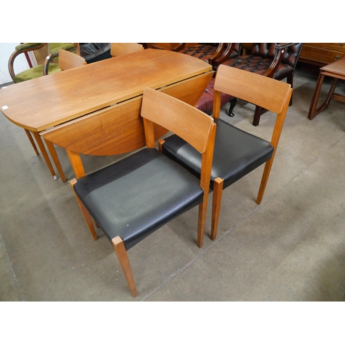 3 - A teak drop leaf dining table and four chairs