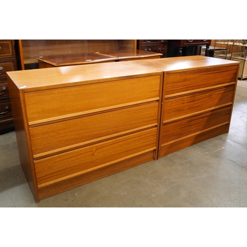 31 - A pair of Danish teak chests of drawers