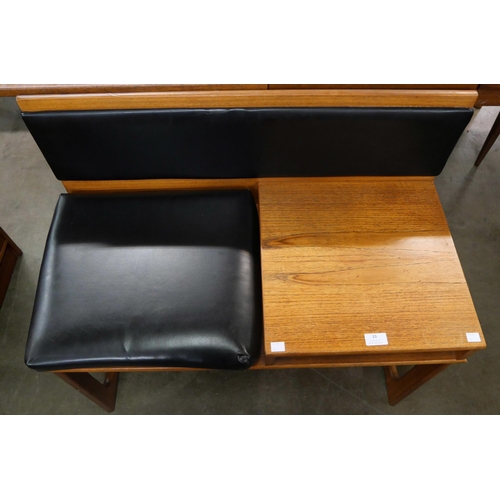 33 - A teak telephone seat