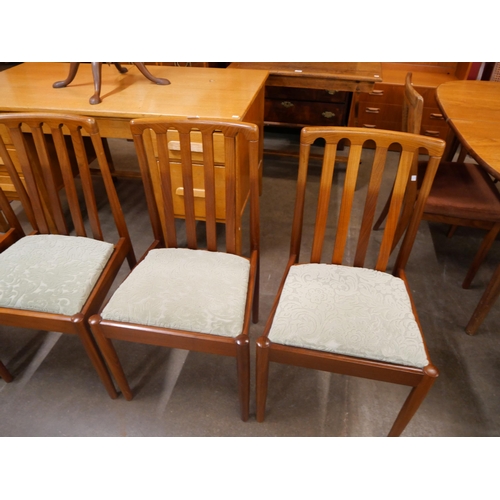 40 - A set of four Meredew teak dining chairs