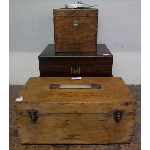 400 - A Belgica pigeon racing clock and three wooden boxes