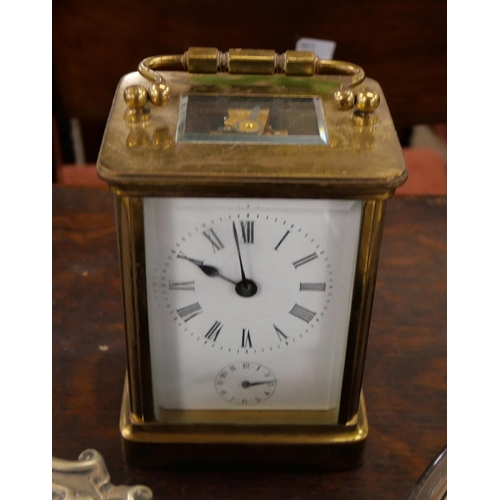 410 - Assorted metalware and a brass carriage clock