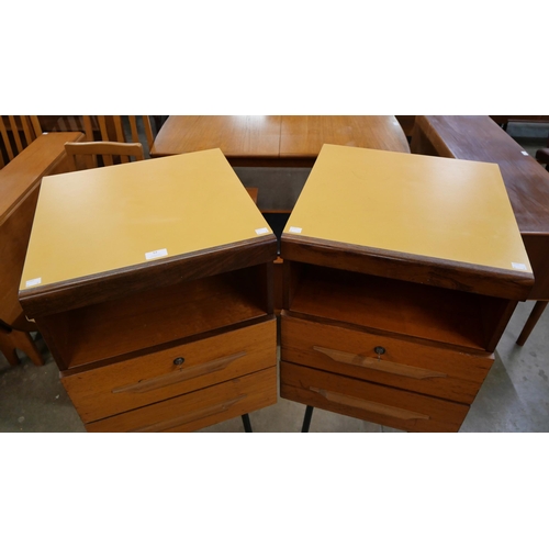 52 - A pair of teak cabinets and black tubulor metal stands