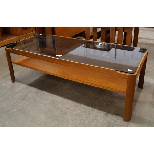 58 - A Myer teak and glass topped rectangular coffee table