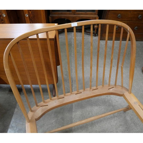 62 - An Ercol Blonde beech single bed frame