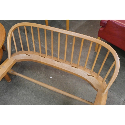 62 - An Ercol Blonde beech single bed frame