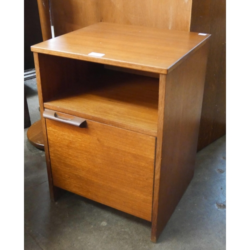 65 - A teak bedside cabinet, a nest of tables and a standard lamp