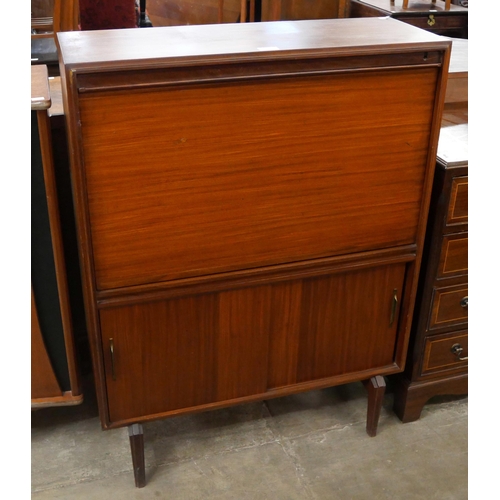 70 - A Beaver & Tapley tola wood writing cabinet