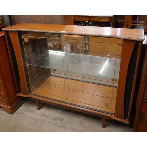 71 - A teak display cabinet