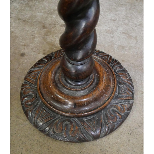 80 - A late Victorian carved oak telescopic barleytwist torchere