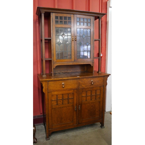 81 - An Arts and Crafts oak bookcase