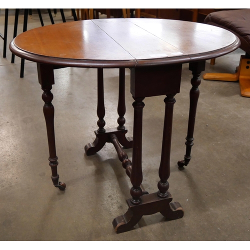 93 - An Edward VII mahogany Sutherland table