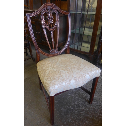 196 - A set of four Hepplewhite Revival mahogany dining chairs