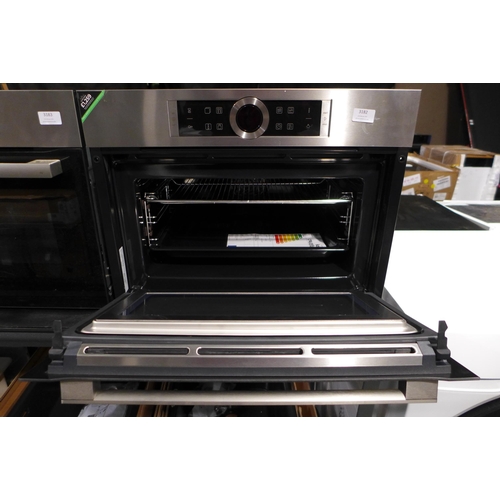 3182 - Bosch Serie 8 Compact Oven with Microwave/ Grill -  H455xW595xD548, model no -CMG633BS1B, Original R... 