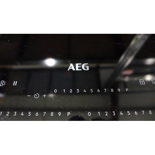 3026 - AEG  5 Zone Multiple Bridge Induction Hob - Damaged/Chipped, Model IKE85751FB, H44xW780xD490, Origin... 