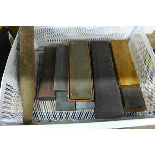 2125 - Nine assorted sharpening stones including some natural stone