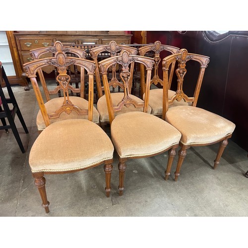 103 - A set of six Victorian inlaid walnut dining chairs