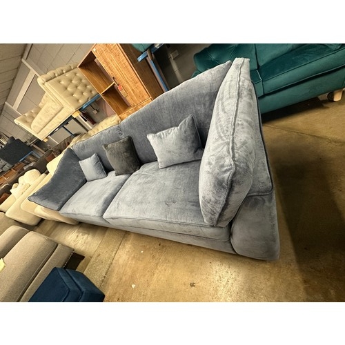 1435 - A Barker & Stonehouse blue velvet four seater sofa RRP £1439