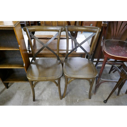 224 - A Fischel beech bentwood two tier occasional table and a pair of chairs