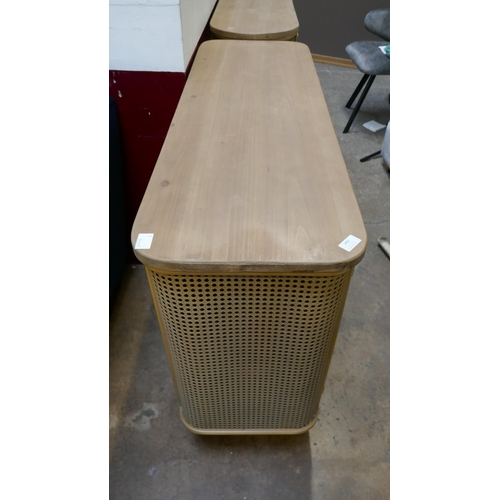 1409 - A wood and rattan design sideboard with wine rack