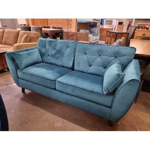 1393 - A turquoise Hoxton velvet three seater sofa, two seater sofa and footstool RRP £1797