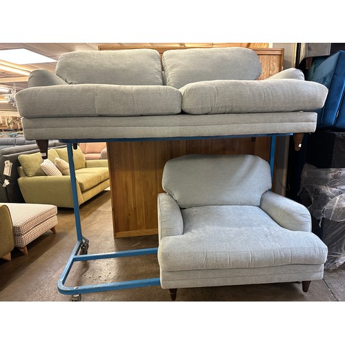 1395 - A pistachio velvet three seater sofa and love seat - damaged corner, marked