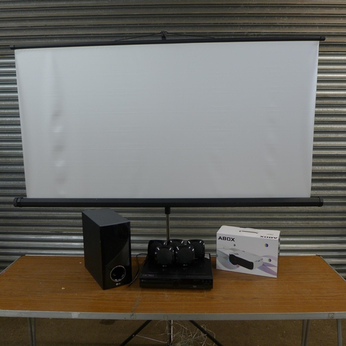 2160 - A projector screen I.LED projector power cord and remote, surround sound system with five small spea... 