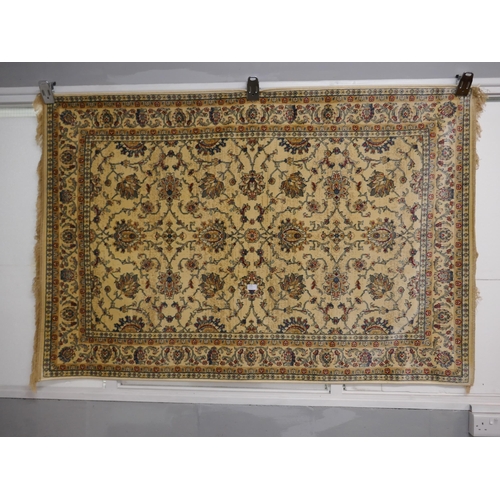 1323 - A gold ground 100% wool pile hand made Indian Tea washed rug, 800 x 500cm