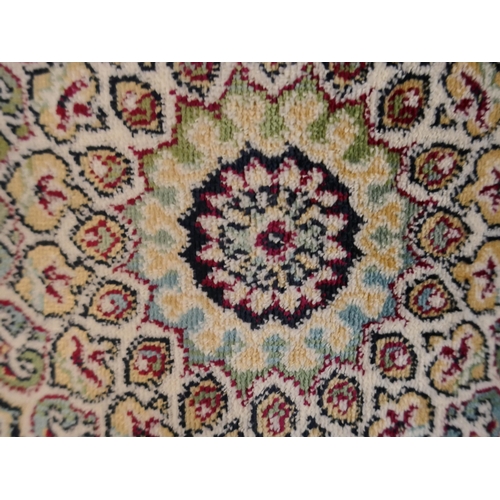 1331 - A multi-coloured ground Kashan rug with medallion design, 135 x 195cm