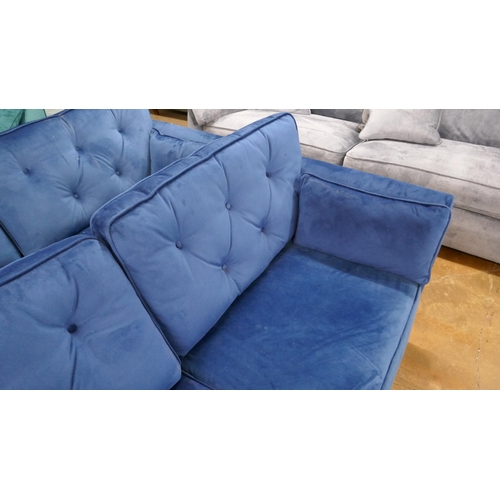 1398 - A Hoxton blue velvet three seater sofa, RRP £799