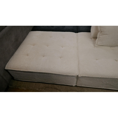 1401 - A cream upholstered modular corner sofa