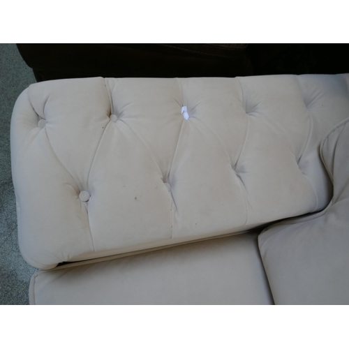 1528 - A cream velvet buttoned sofa bed