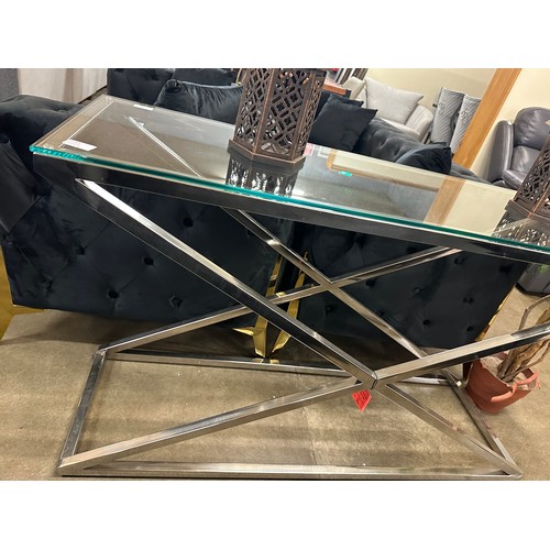 1355 - A glass and chrome console table * this lot is subject to VAT