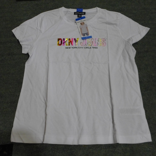 3384 - Quantity of women's white DKNY T-shirts - mixed size * this lot is subject to VAT