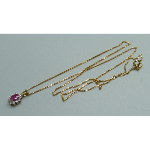 1008 - A 9ct gold, diamond and ruby pendant on a 9ct gold chain, 1.6g, chain 43cm