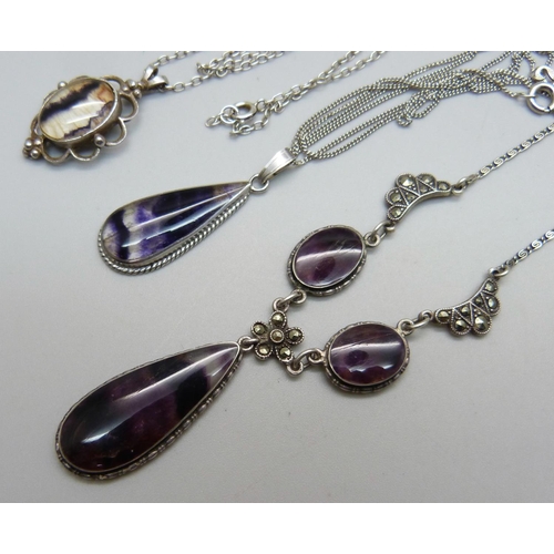 1009 - Two silver and Blue John pendants and a similar necklace