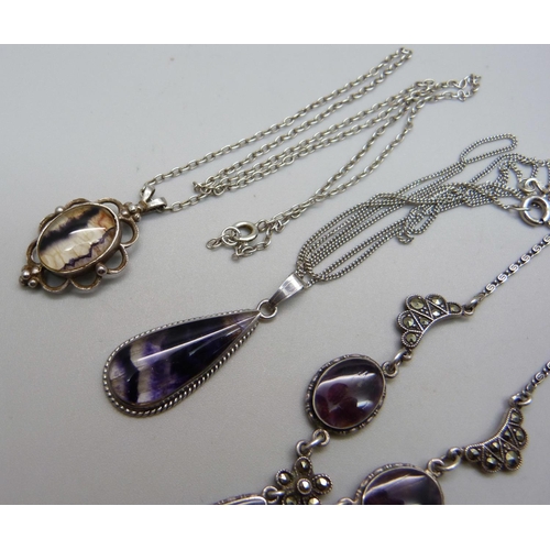 1009 - Two silver and Blue John pendants and a similar necklace