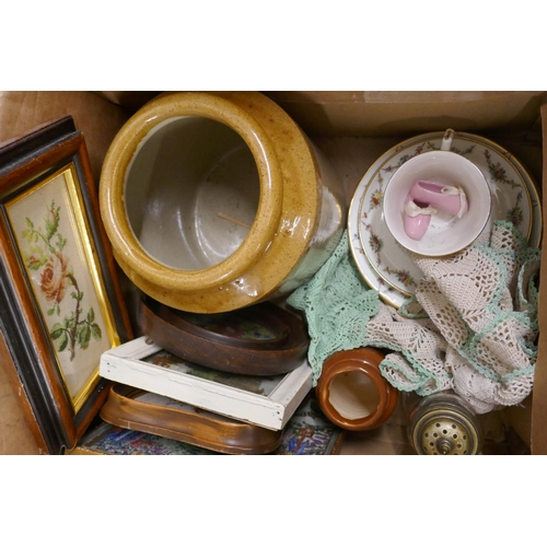 1058 - Two boxes of assorted china, metalwares, needleworks and a Manor Collectibles model of a British Bul... 