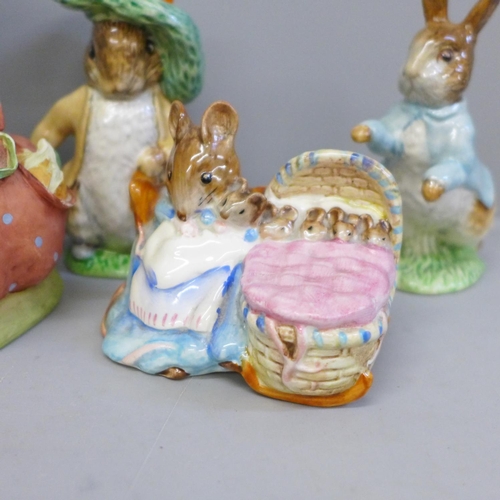 619 - Three Beswick Beatrix Potter figures, Hunca Munca with gold backstamp, Peter Rabbit and Benjamin Bun... 