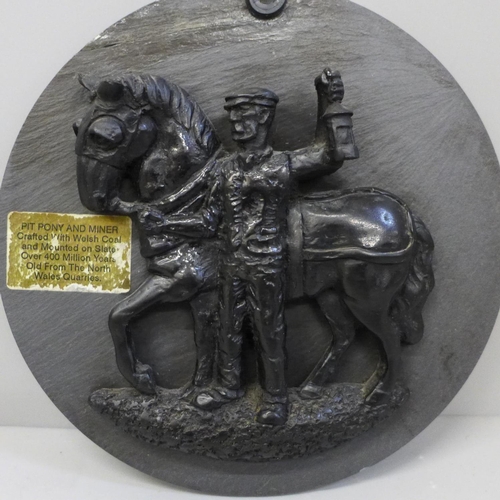 631 - A pit pony and a Welsh miner slate and coal Welsh plaque from the Welsh quarries, 16cm, a/f